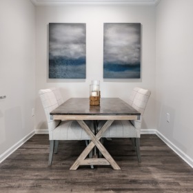 a dining room table and chairs